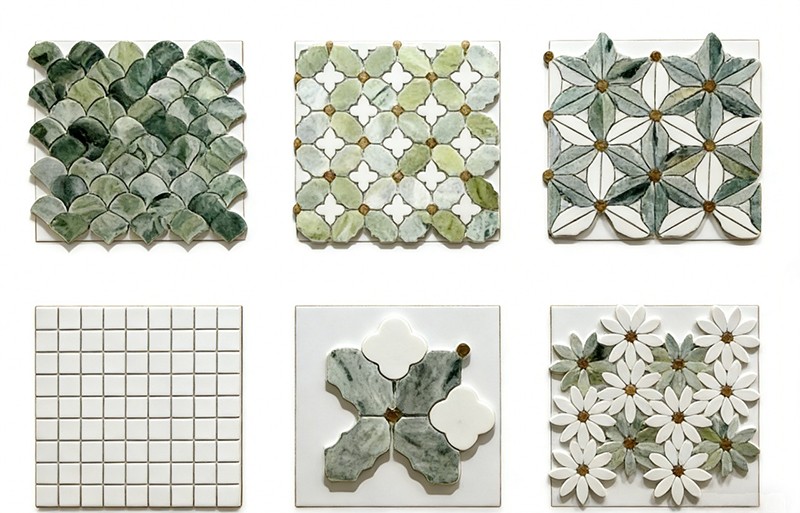Set of six decorative green stone mosaic tiles, featuring floral and geometric designs for wall art and interior accents.jpeg